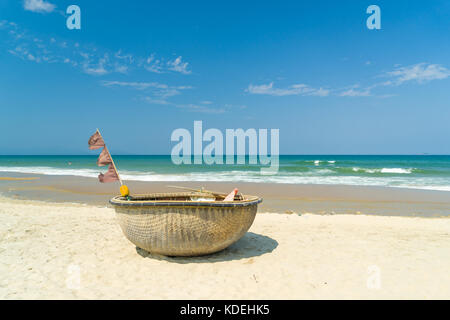 Traditional fishing boat on the beach of Hoi An Da Nang Vietnam Stock Photo