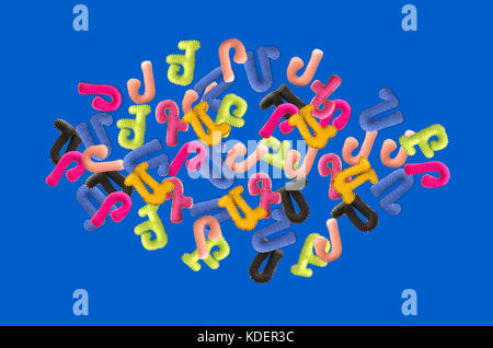 Letters stitched from felt fabric on a blue background Stock Photo