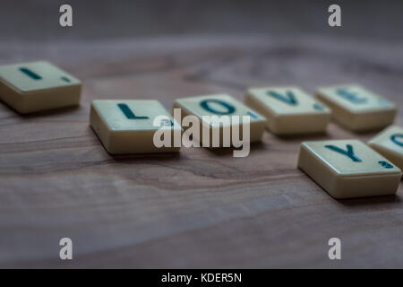 I love you romantic words scrabble tile lettering Stock Photo