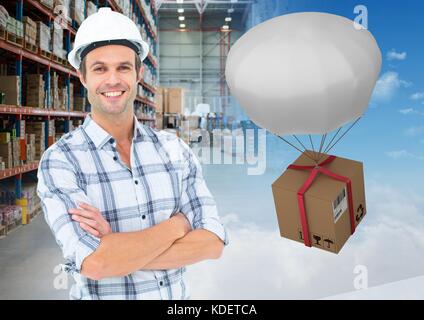 Digital composite of man with boxes in warehouse, transition Stock Photo