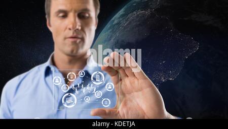 Digital composite of man holding glass interface Stock Photo