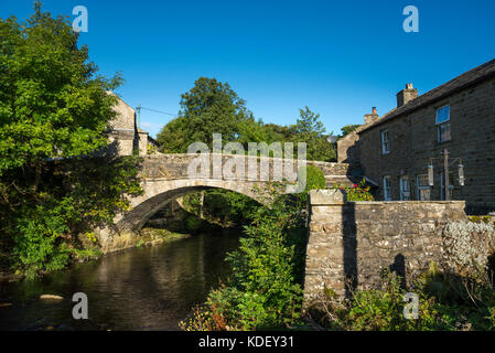 Stone bridge at Langthwaite in Arkengarthdale, North Yorkshire, England. Stock Photo