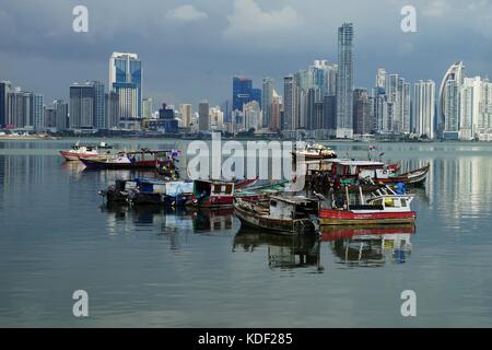 Overcast day in Panama City - view Over Panama Bay with skyline and fishing boats on the foreground Stock Photo