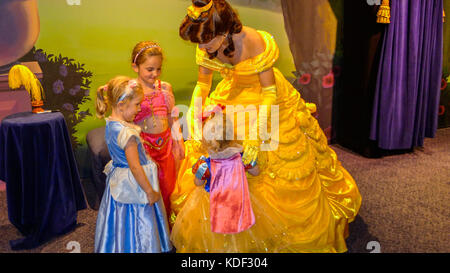 Little girls, child, children kids meeting Princess Belle, Beauty and the Beast, in Magic Kingdom, Disney World, Florida, USA