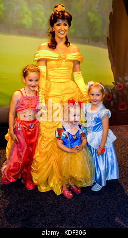 Little girls children kids meeting Princess Belle, Disney's Beauty and the Beast in Magic Kingdom, Disney World, Florida, USA