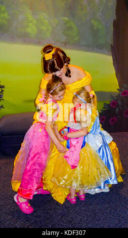 Little girls meeting Princess Belle, in Magic Kingdom, Disney World, Florida, USA