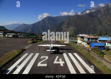 Flying into a dangerous airport in Lukla, Nepal Stock Photo