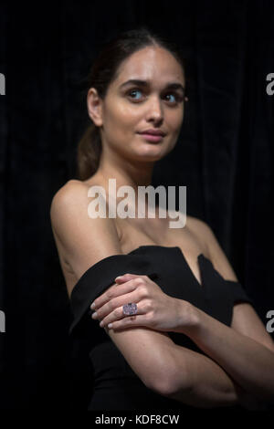 A model wears 'The Raj Pink', the world's largest known 'fancy intense pink diamond' before it is offered at auction, estimated to fetch $20-30 million in Sotheby's Geneva sale of Magnificent and Noble Jewels on 15 November 2017. Stock Photo