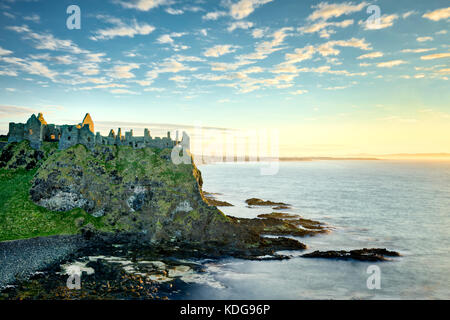 Dunluce Castle,at sunset. Northern Ireland. Stock Photo