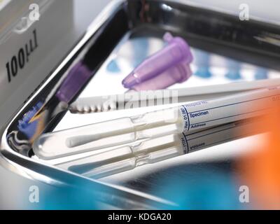 Swab containing a DNA (Deoxyribonucleic acid) human sample with genetic ...