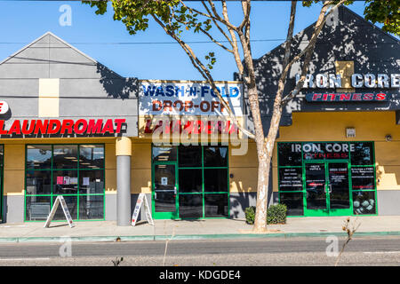 Laundry Laundromat Fitness center on 14th Street in San Leandro California USA one of the main business streets in the city Stock Photo