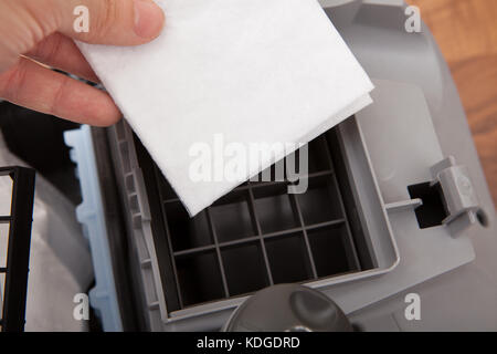 Close-up Of A Person's Hand Holding Cleaning Equipment Stock Photo