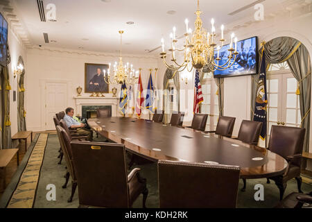 Grand Rapids, Michigan - Visitors sit at the table in the replica of the White House cabinet room at the Gerald Ford Presidential Museum. Stock Photo