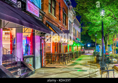 ATHENS, GEORGIA - AUGUST 13, 2017: Shops and bars along College Avenue in downtown Athens at night. Stock Photo