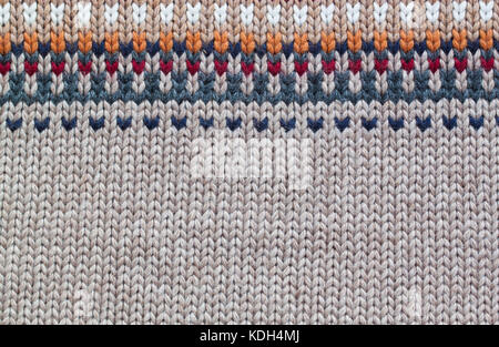 Grey and beige realistic knitting pattern. Wool. Stock Photo
