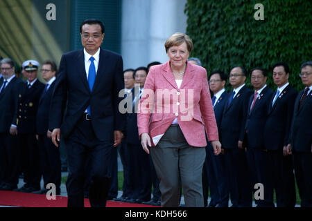 Chinese Prime Minister Li Keqiang, German Chancellor Angela Merkel - Reception with Military Honours. Stock Photo