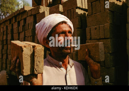 Brick makers at work, Lahore, Pakistan, Stock Photo