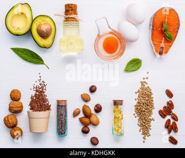 Selection food sources of omega 3 . Super food high omega 3 and unsaturated fats for healthy food. Almond ,pecan ,hazelnuts,walnuts ,olive oils ,fish  Stock Photo