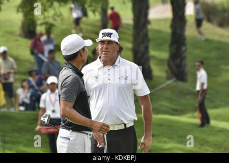 Kuala Lumpur, MALAYSIA. 14th Oct, 2017. Pat Perez of USA(L), Kang Sung-hoon of South(R) chats during the CIMB Classic 2017 day 3 on October 14, 2017 at TPC Kuala Lumpur, Malaysia. Credit: Chris Jung/ZUMA Wire/Alamy Live News Stock Photo