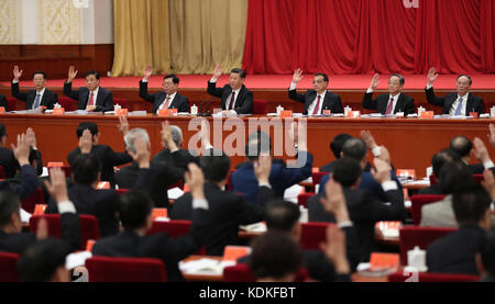 Beijing, China. 14th Oct, 2017. Xi Jinping (C), Li Keqiang (3rd R), Zhang Dejiang (3rd L), Yu Zhengsheng (2nd R), Liu Yunshan (2nd L), Wang Qishan (1st R) and Zhang Gaoli (1st L) attend the Seventh Plenary Session of the 18th Communist Party of China (CPC) Central Committee in Beijing, capital of China. The plenum was held from Oct. 11 to 14 in Beijing. Credit: Ma Zhancheng/Xinhua/Alamy Live News Stock Photo