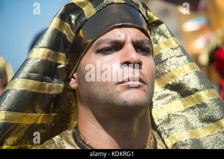 Alexandria, Egypt - 30 September 2017 - The inaugural festival in honor of Cleopatra coincided today with World Tourism Day.  The event included a parade along the corniche seafront with Cleopatra dressed in her golden royal robes and distinctive crown, accompanied by her two ladies-in-waiting and six officers dressed as ancient Egyptian soldiers.  The event also brings awareness about new discoveries made in the bottom of the Mediterranean Sea in the Alexandria area where 72 wrecks, 20 ships and army aircrafts from WWI and WWII and others that date back to 300 BC have been discovered.  An ini Stock Photo