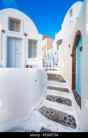 Narrow neighborhood at the old traditional village of Emporio, Santorini, Greece. Stock Photo