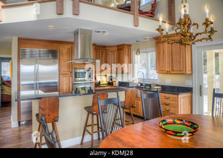 Stainless steel appliances in a modern, upscale kitchen in Vermont, USA. Stock Photo