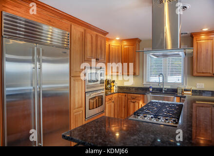 Stainless steel appliances in a modern, upscale kitchen in Vermont, USA. Stock Photo