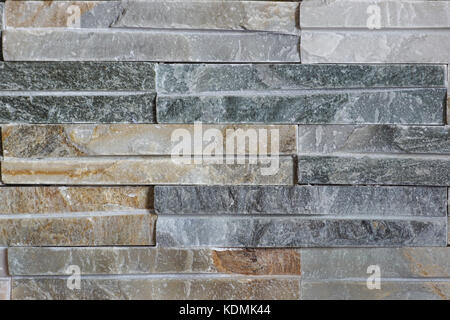 The ceramic tile in brick wall pattern design with dark grey tone Stock Photo