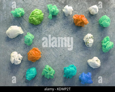 Colorful plastic bag on cement floor Stock Photo