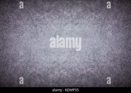 Grey textured concrete wall. Dark edges Stock Photo