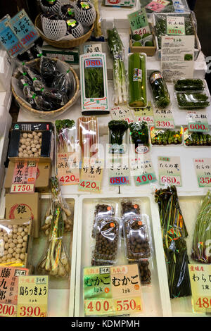 Kyoto, Japan -  May 22, 2017:  Selling variation of fresh raw packed vegetables at the Nishiki market in kyoto, Kyoto's Kitchen Stock Photo