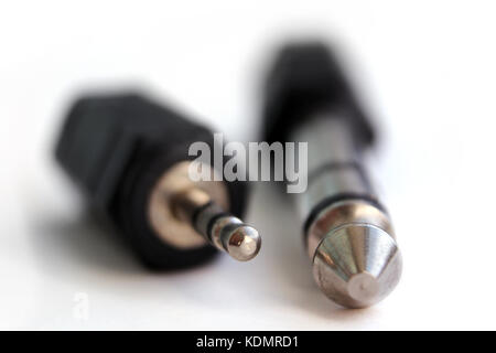 Pair of stereo TRS  jack and mini-jack adapters, close-up Stock Photo