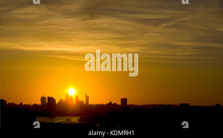 Sun Set Behind a Silhouetted London City Stock Photo