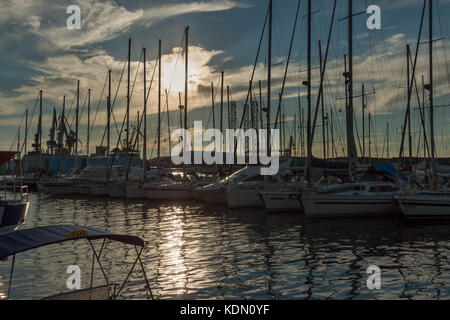 Boats in marina on a sunny day with some clouds Stock Photo