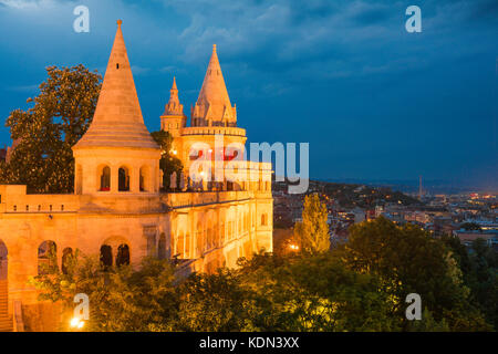 Budapest Fishermens Bastion, view of a turreted section of the Fishermen's Bastion at night illuminated by floodlights, Buda, Budapest, Hungary. Stock Photo