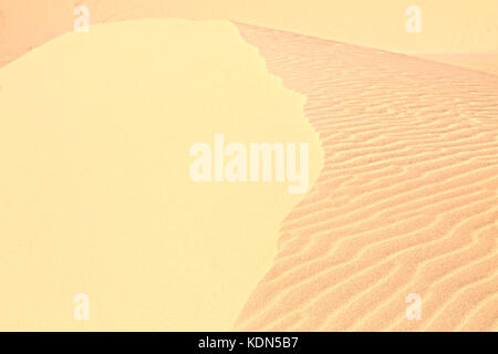 patterns in the sand dunes made by the wind movements Stock Photo