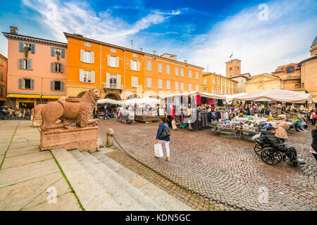 weekly street market in Little Square of Reggio Emilia in Italy Stock Photo