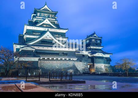 Kumamoto Castle at night in Chuoku, Kumamoto, Japan. Stock Photo