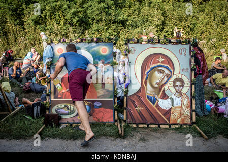 Cross Procession from Kamianets-Podilsky to the Holy Dormition Pochaev Lavra, August 19 - 25, 2017, Ukraine. For more than 150 years the procession gathered thousands of pilgrims who would cross the path of 210 kilometers during 7 days. Over 20 thousand believers took part in the event this year. Stock Photo