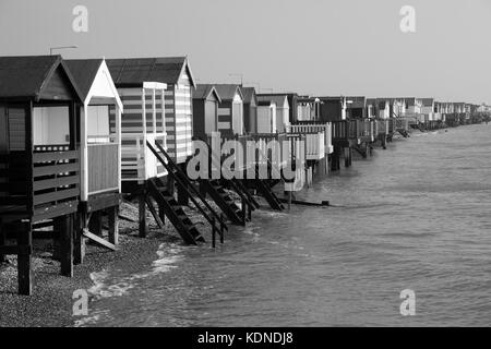 Black and white image of beach huts, at Thorpe Bay, near Southend-on-Sea, Essex, England Stock Photo