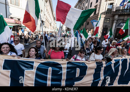 Rome, Italy. 14th Oct, 2017. National Movement for Sovereignity, an Italian national-conservative political party, held a demonstration to protest against the invasion of immigrants and to defend the Italian work in Rome, Italy on October 14, 2017. Credit: Giuseppe Ciccia/Pacific Press/Alamy Live News Stock Photo