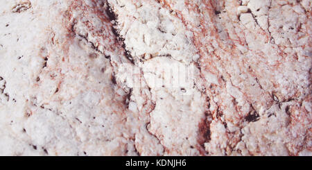 Textured stone background. Retro filter image. Marble Stone Background. Rough rock texture. Toned photo. Lycian Way Holidays, Turkey. Wide format. Stock Photo