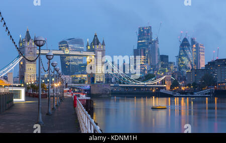 London - The Tower Bride, promenade and skyscrapers at dusk. Stock Photo
