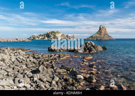 Island Lachea and a sea stack, geological features in Acitrezza (Sicily) Stock Photo