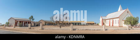 KARASBURG, NAMIBIA - JUNE 13, 2017: The Roman Catholic Holy Trinity Church and school in Karasburg in the Karas Region of Namibia Stock Photo