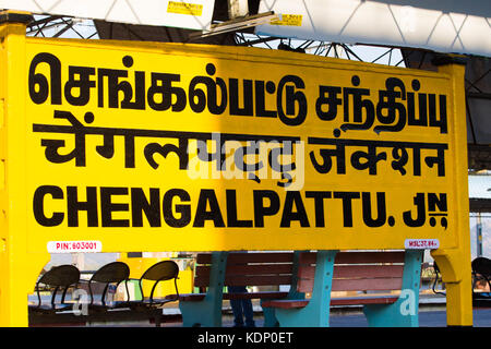 Railroad sign Chengalpattu written in Tamil official language of Tamilnadu , Hindi and English on platform of the railway station Stock Photo