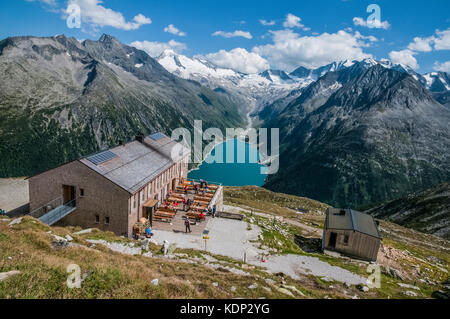 The Olperer  Hut mountain refuge in the Zillertal Alps overlooking the Schlegeis Stausee Stock Photo