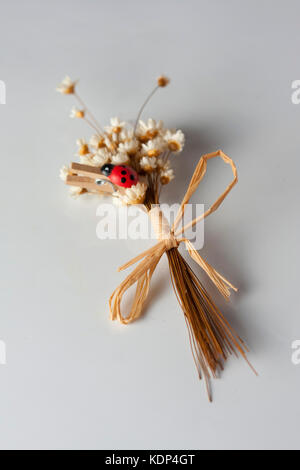 Dry decorative small flowers tied togrther Stock Photo