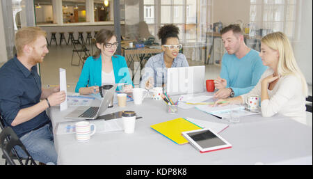 Group of people collaborating in office Stock Photo